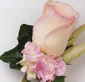 For the Groom: This coordinated series features shells as accents to convey the spirit of a seaside ceremony.